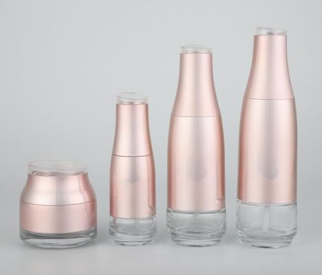 La lotion crème en verre rose de pot met Logo And Color en bouteille adapté aux besoins du client par emballage cosmétique