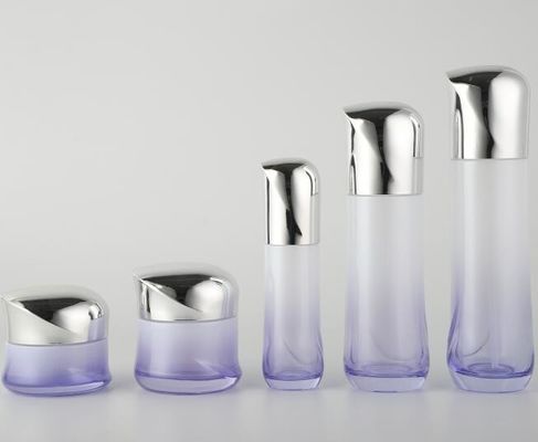 Les bouteilles cosmétiques en verre de luxe avec les couvercles/la lotion plaqués pot de crème met l'emballage en bouteille cosmétique