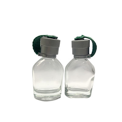 Le petit parfum en verre d'OEM 25ML met le chapeau en bouteille de conception de bouilloire de voyage