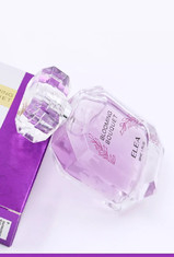 Les bouteilles de parfum 100ml de luxe vides en verre ont gravé Logo With Surlyn Cap en refief