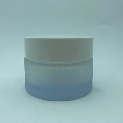 Bouteille cosmétique 100 ml enduit en spray de fleurs de glace Bouteille avec crème à capuche blanche Bouteille de soin de la peau Emballage OEM