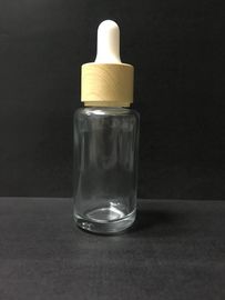 Bouteille transparente de compte-gouttes de verre à bouteilles de l'huile 30ml essentielle avec l'emballage en plastique de soins de la peau de chapeau