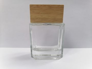 bouteilles de parfum 50ml en verre avec le maquillage transparent de chapeau en bois empaquetant la diverses couleur et impression