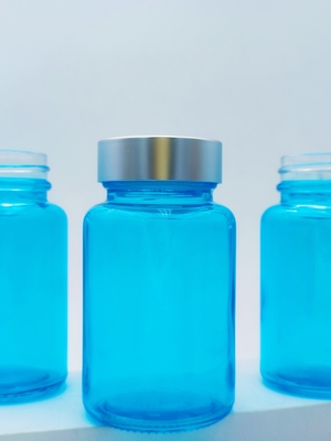 Bouteille de 100 ml en capsule de verre Supplément capillaire Bouteille ronde en capsule en verre Pour le sérum pour les yeux et le sérum pour le visage OEM