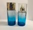 Les bouteilles crèmes cosmétiques en verre bleues/bouteille rechargeable de pompe ont adapté le logo et la couleur aux besoins du client