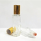 le rouleau en verre de 5ml 10ml 15ml met le petit pain en bouteille vide sur des bouteilles pour les huiles essentielles